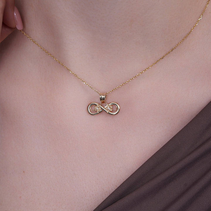 14k Yellow Gold Infinity Flowers Pendant with Cubic Zirconia Stones