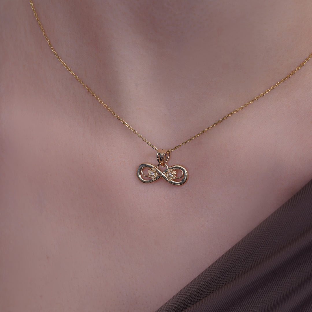 14k Yellow Gold Infinity Flowers Pendant with Cubic Zirconia Stones