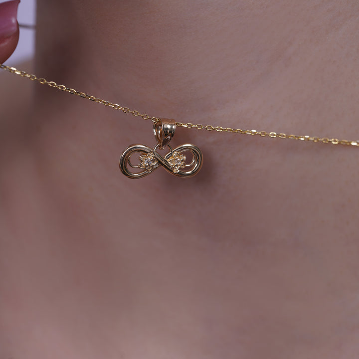 14k Yellow Gold Infinity Flowers Pendant with Cubic Zirconia Stones